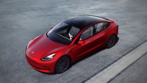 A red 2019 Tesla Model 3