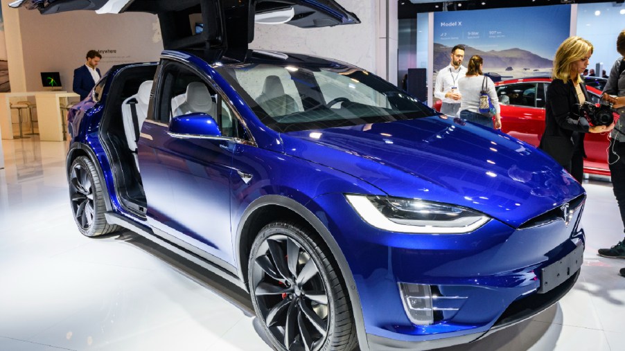 A blue Tesla Model X 90D full electric luxury crossover SUV car on display at Brussels Expo on January 9, 2020 in Brussels, Belgium.