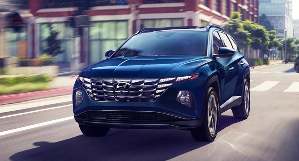 A blue Hyundai Tuscon Hybrid.