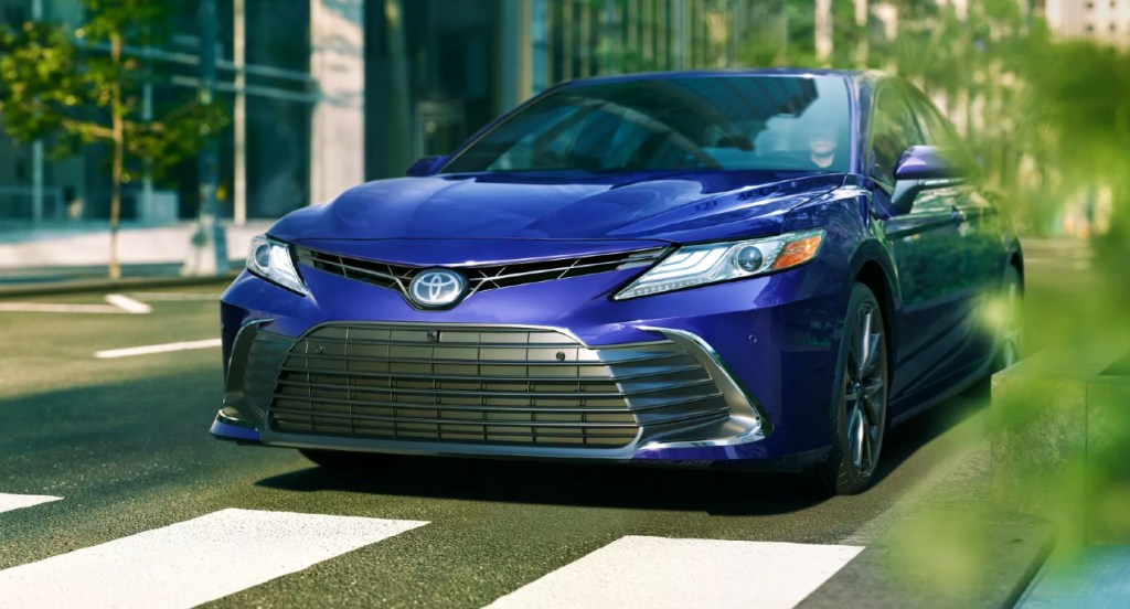 A blue Toyota Camry. 