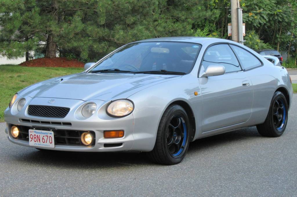 1995 sliver Toyota Celica GT-Four with black Enkei wheels.