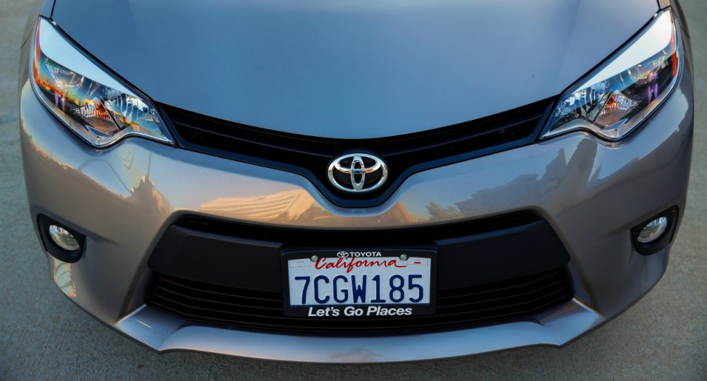 A gray Toyota Corolla. 