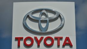Toyota dealership sign with the logo and company name written underneath.