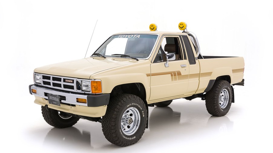 Beige 1986 Toyota pickup truck
