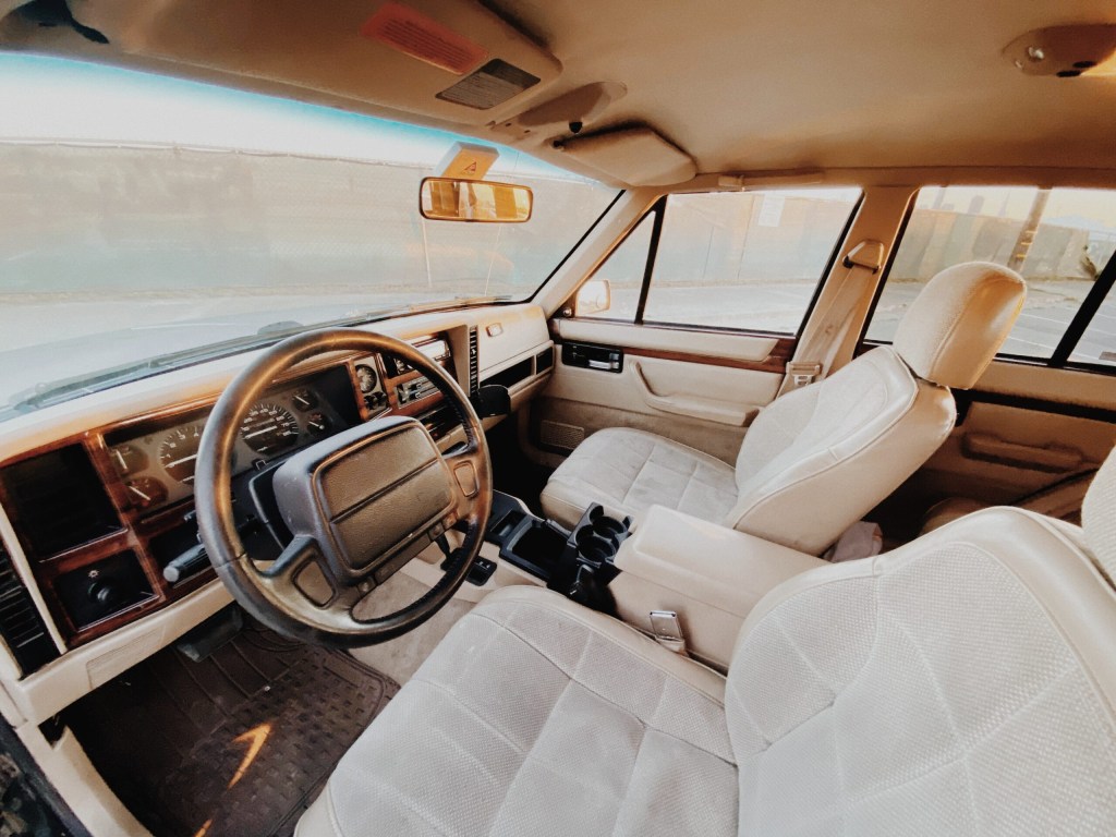 Overland Jeep Cherokee XJ interior with tan seats