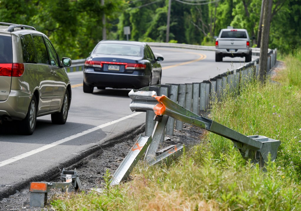 A broken guardrail on Route 10 at the intersection with Hope Way Lane in Cumru Township, Pennsylvania, in June 2021. Carfax reports can show if used vehicles have been in accidents such as this one.