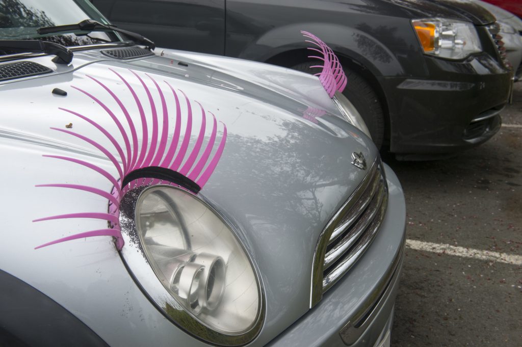 Eyelashes on a Mini Cooper in the town of Poulsbo in Kitsap County, Washington.