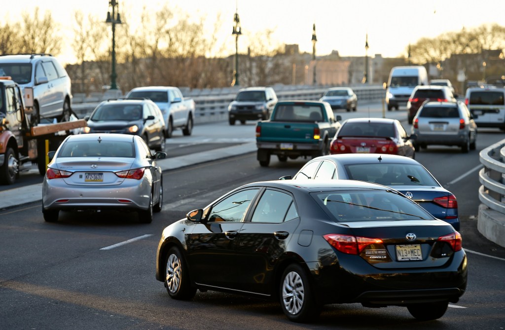 Cars on the Penn Street Bridge at rush hour in Reading, Pennsylvania, in December 2020. City driving can wreak havoc on a vehicle's brakes.