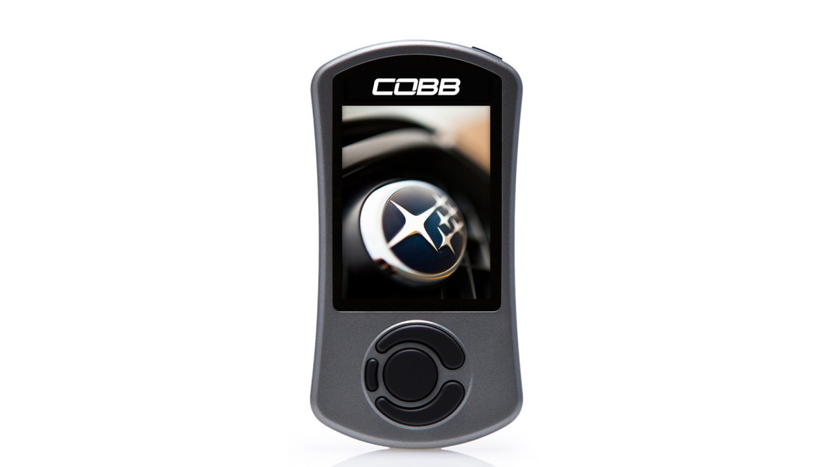 A front view of a Cobb Tuning Access port device.