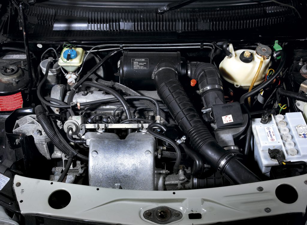 Engine bay of a 1987 Peugeot 205 GTI 1.6