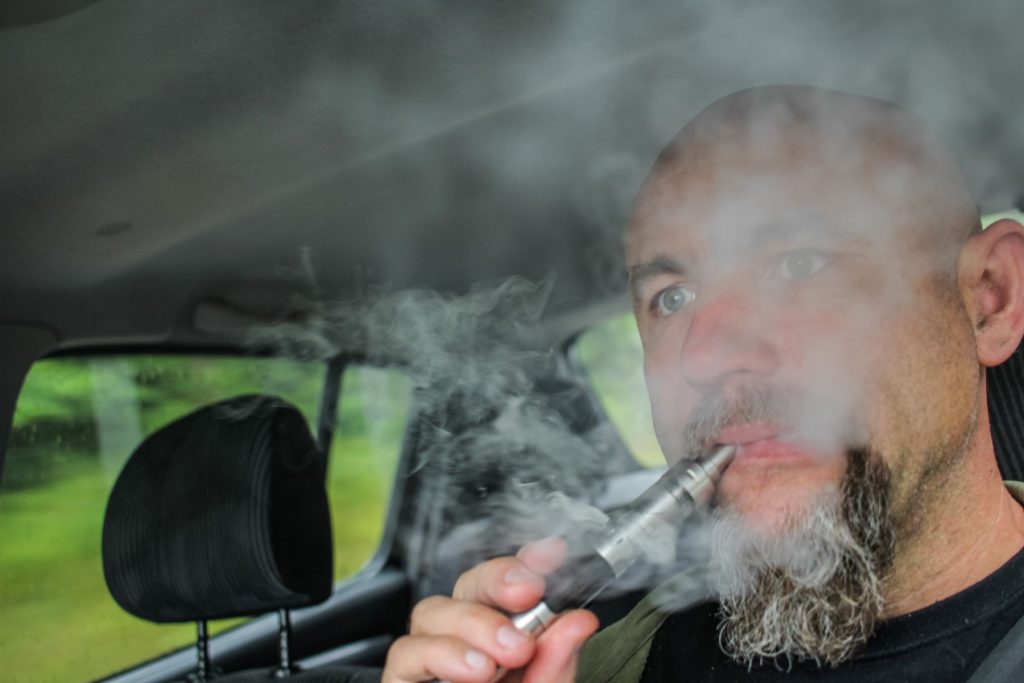 A man vaping while driving his car in Gdansk, Poland