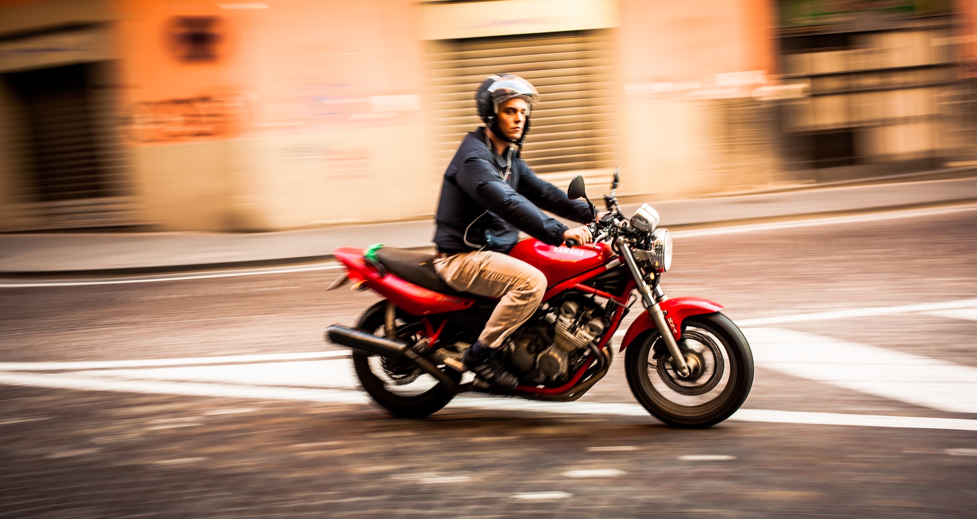 A man rides a motorcycle through the streets of Naples, Italy, in October 2012. One Italian man's motorcycle accident caused his heart to rotate 90 degrees.