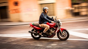 A man rides a motorcycle through the streets of Naples, Italy, in October 2012. One Italian man's motorcycle accident caused his heart to rotate 90 degrees.