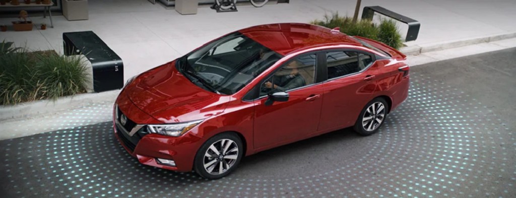 An aerial shot of a red 2021 Nissan Versa.