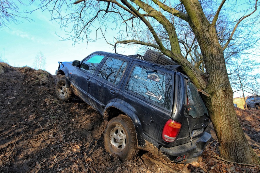 A 4x4 Ford Explorer SUV crashed into a tree while mudding