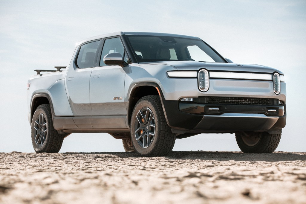 Rivian electric pickup truck parked in the desert