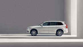 An ice-white 2021 Volvo XC90 in a white room.