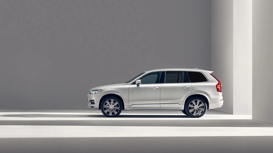 An ice-white 2021 Volvo XC90 in a white room.