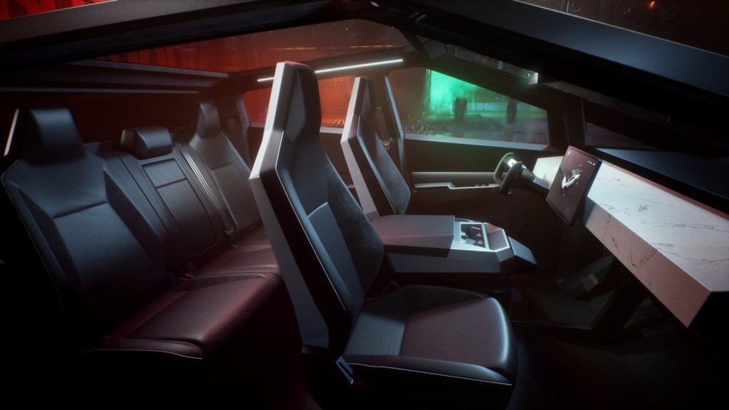 This is a promotional photo of the interior of the Tesla Cybertruck like you will find in the top-trim tri-motor.