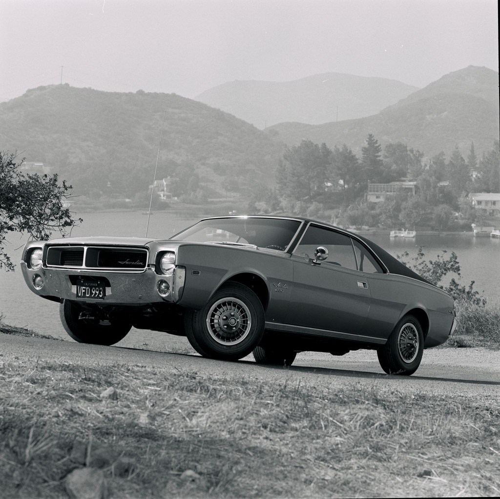 A 1968 AMC Javelin SST parked on a hill