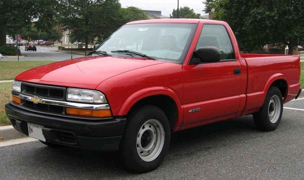 A red 1982 Chevrolet S-10 parked outside