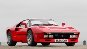This vintage Ferrari is a red 1985 288 GTO