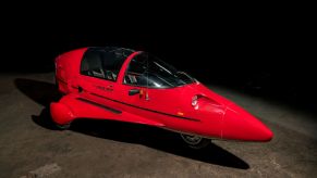 A red 1985 Pulse Litestar Autocycle