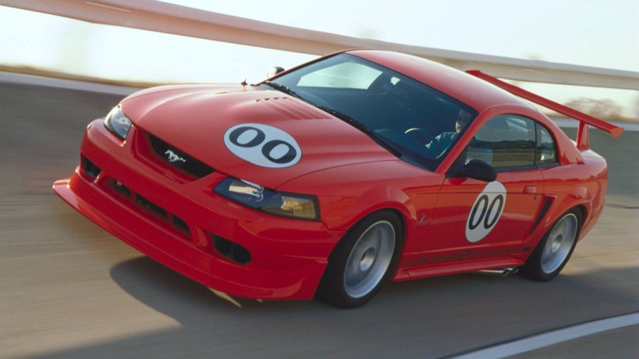2000 Ford Mustang SVT Cobra driving on track