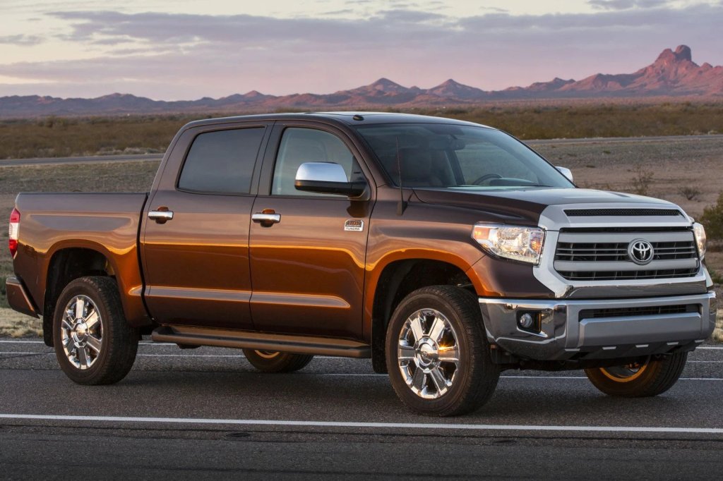 A brown 2015 Toyota Tundra parked during sunset - one of the best 5 used pickup trucks under $20,000