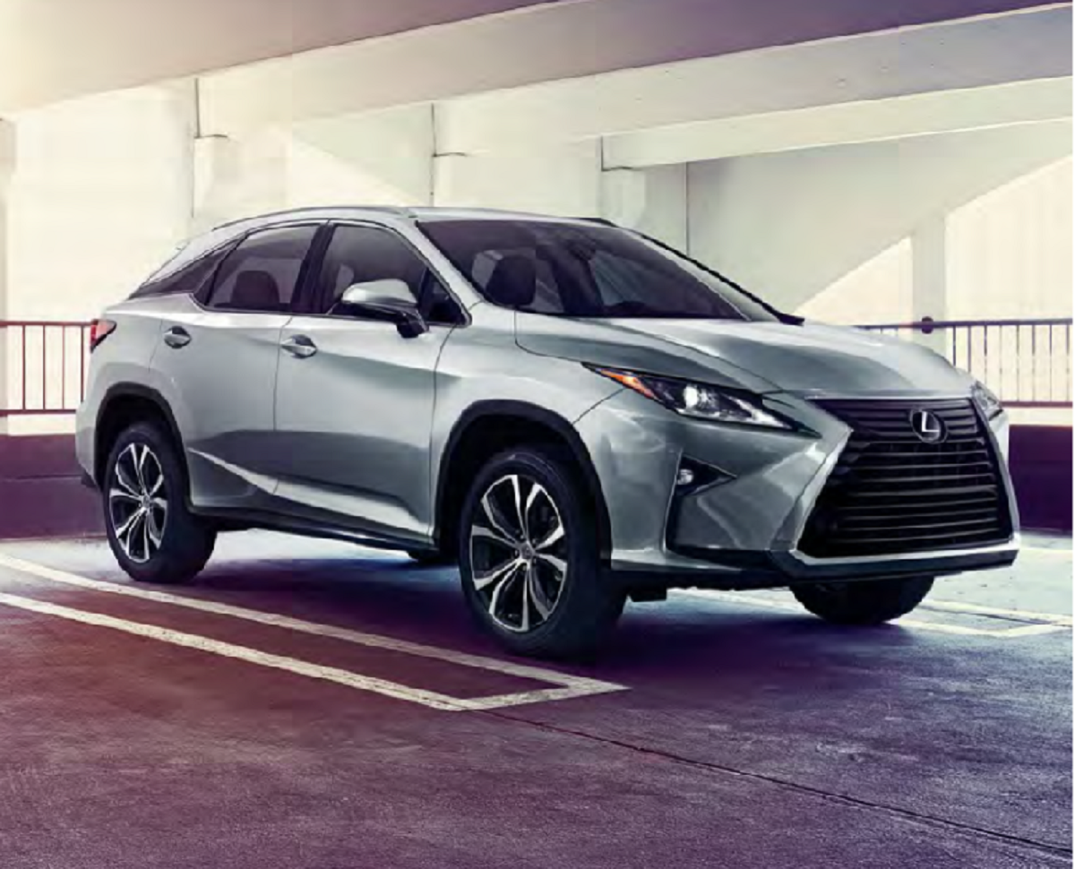 A silver 2016 Lexus RX in a parking garage. It's known as a reliable SUV. 