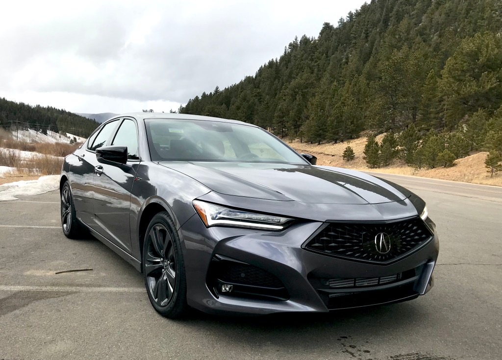 A front shot of the 2021 Acura TLX A-Spec next to a mountain for our full review