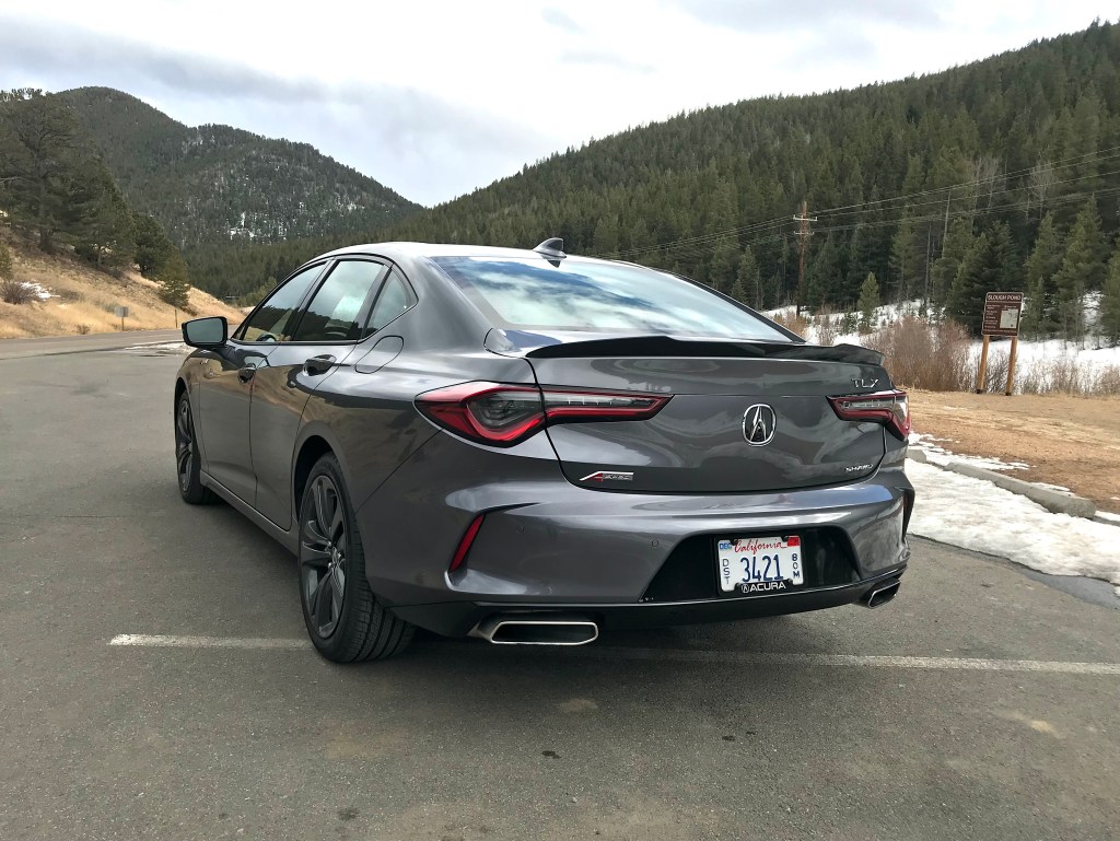 A rear shot of the 2021 Acura TLX A-Spec next to a mountain for our full review