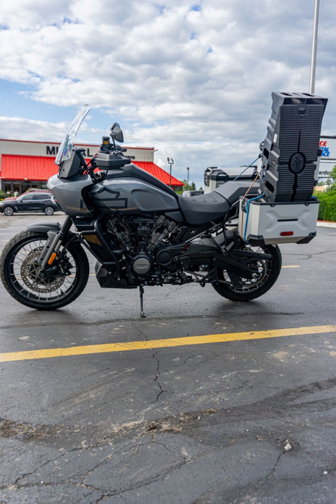 The left side view of a gray-and-black 2021 Harley-Davidson Pan America Special with accessories and cargo