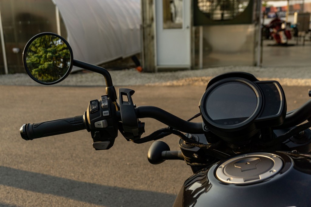 The left handlebar controls and LCD gauge on a black 2021 Honda Rebel 1100 DCT