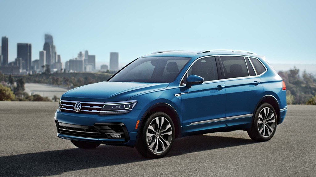A blue 2021 Volkswagen Tiguan parked outside during the day