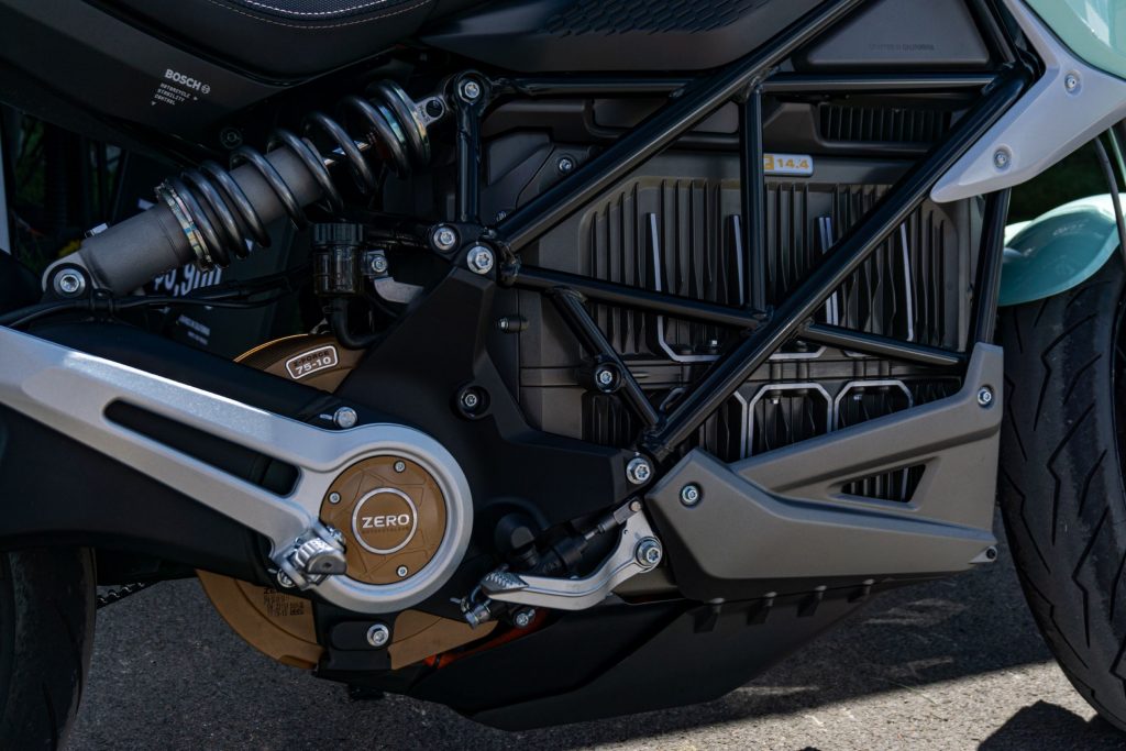 A close-up view of a mint-green 2021 Zero SR/F Premium's motor and battery pack