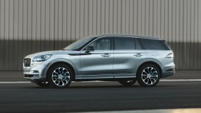 A silver 2022 Lincoln Aviator parked outside during the day