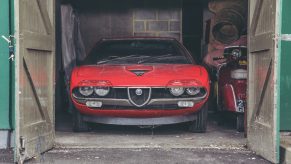 Alfa Romeo barn find poking its nose out of the garage doors