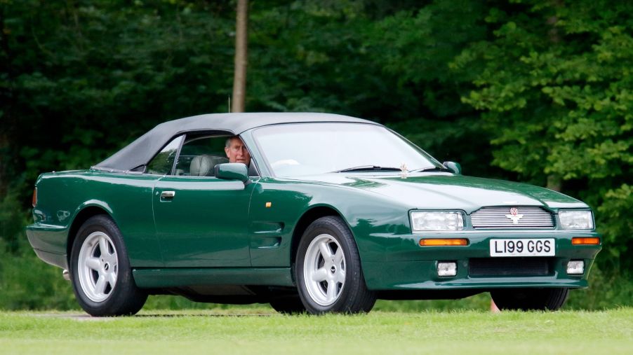 An Aston Martin Virage Volante model being driven by Prince Charles