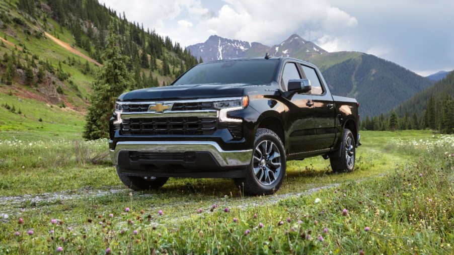 Black 2022 Chevrolet Silverado with mountains in the background