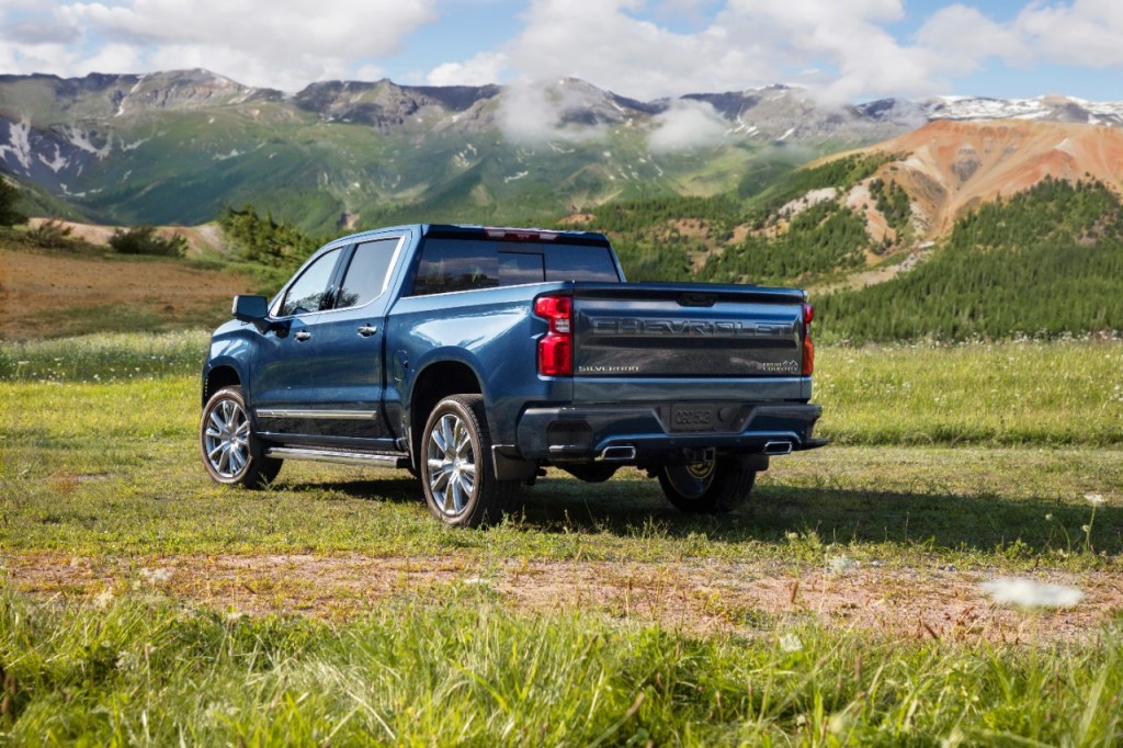 Blue 2022 Chevrolet Silverado with mountains in the background