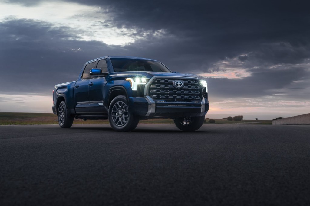 Blue 2022 Toyota Tundra with a cloudy sky in the background