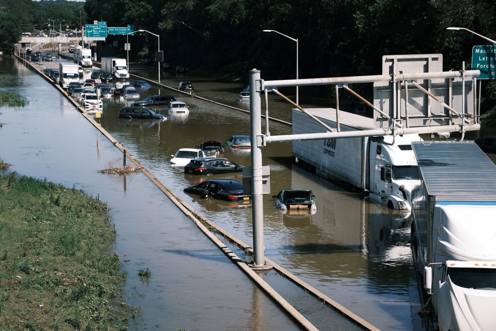 Cars On Flooded Highway