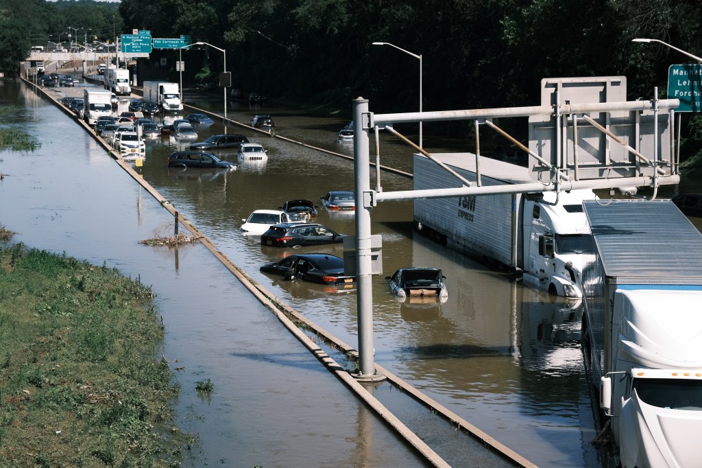 Cars On Flooded Highway