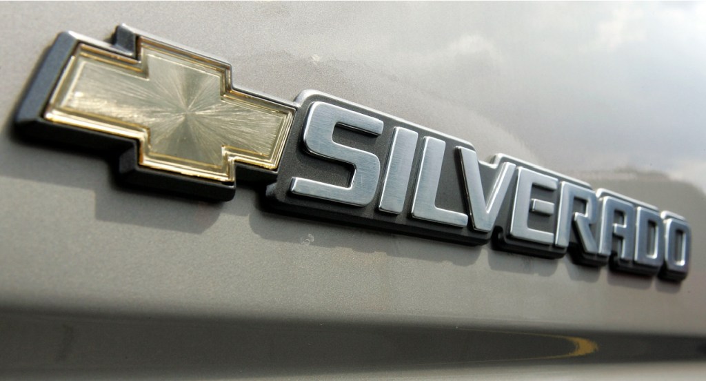 The Chevrolet Silverado logo badge on a truck. 