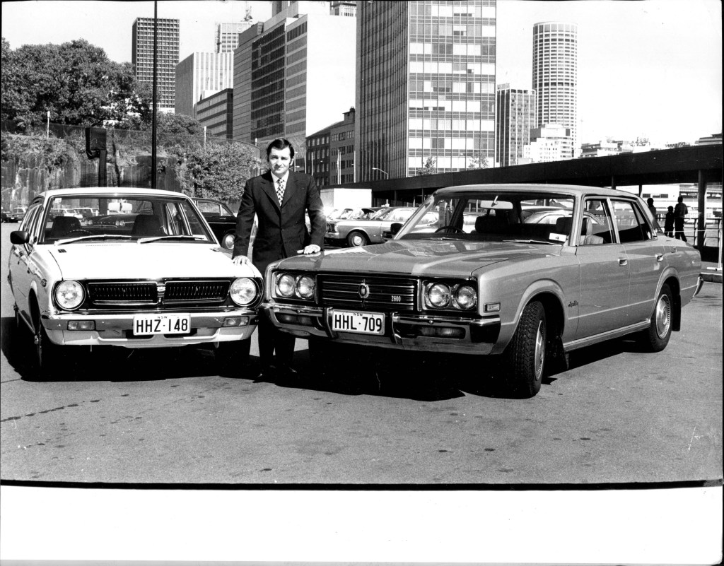 Vintage Toyotas in black and white photo