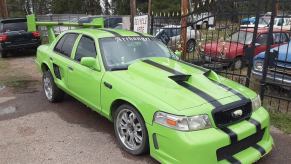 Clown Vic Ford Crown Victoria in front of recycling center