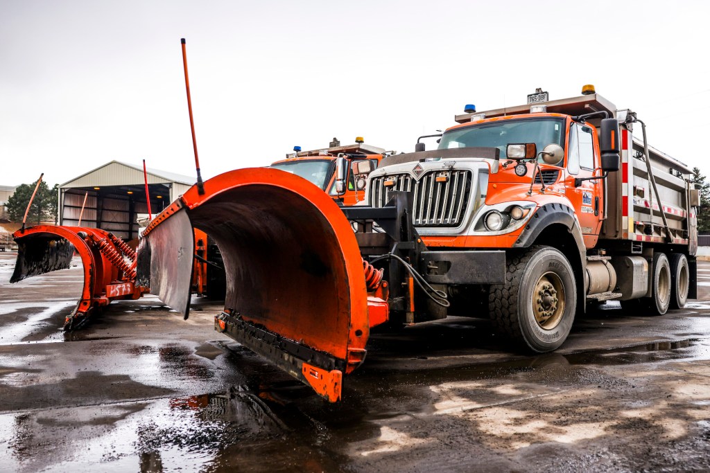 Colorado DOT snow plows prepare for a winter storm in March 2021 in Golden