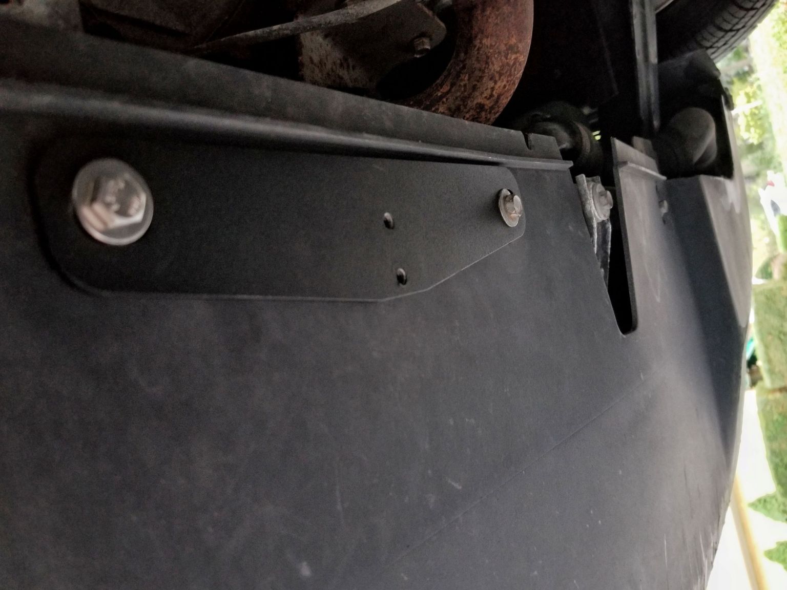 How Do You Install a Front License Plate Without Damaging Your Car?