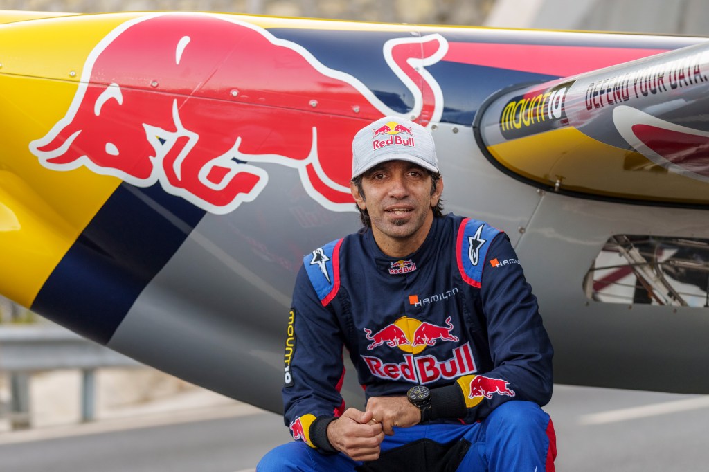 Dario Costa Posed In Front Of Red Bull Stunt Plane